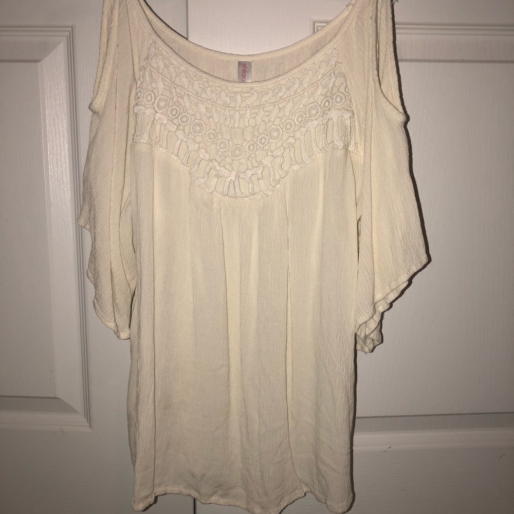 Cold shoulder cream top